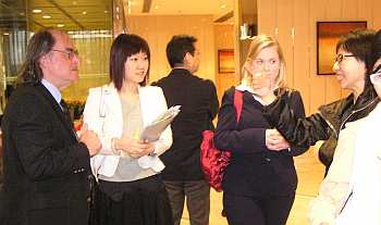Participants meet in the hotel lobby