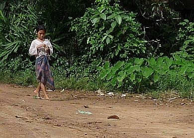 Girl walking on the road