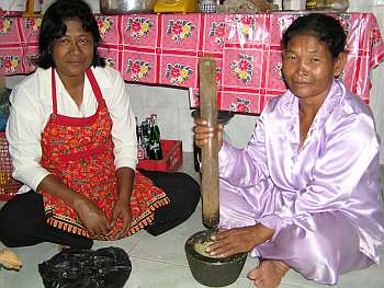 Two deaf women cooking
