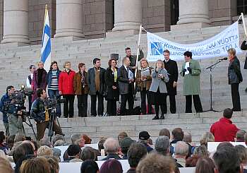 Speaking on the steps of Parliament