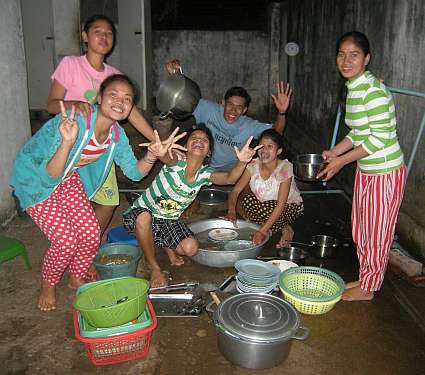 Students washing dishes