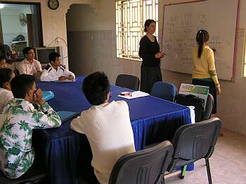 Stephanie Linder training deaf students