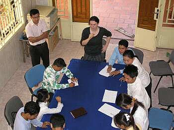 Stephanie Linder and Sou Poly with students