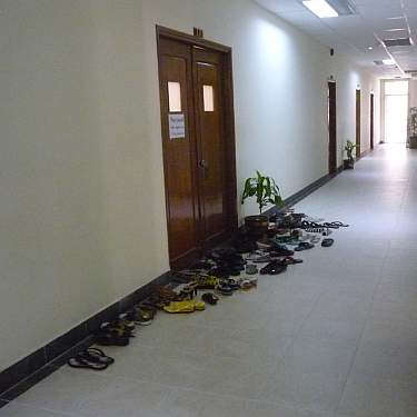 Shoes outside the meeting room door